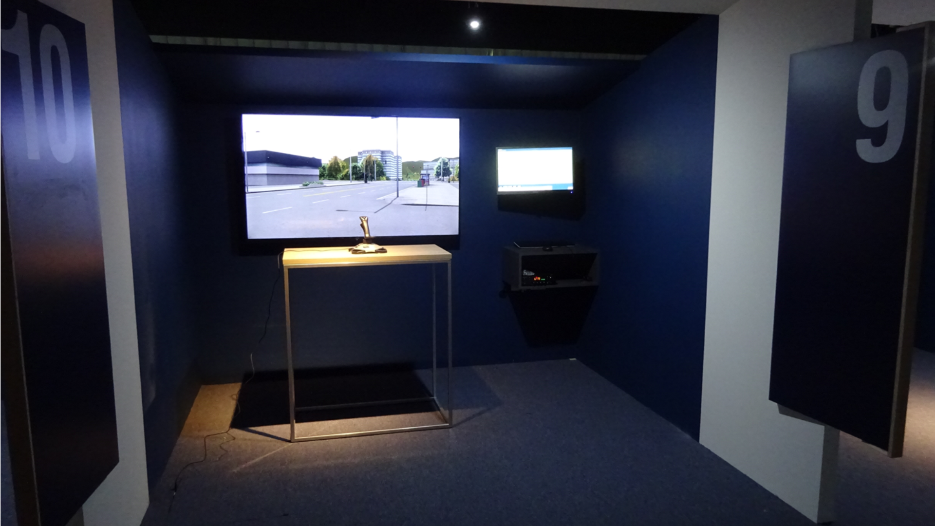 Field Unit Station with two displays, to view the 3D scene and control resources on the 2D map, and a joystick to explore the environment.